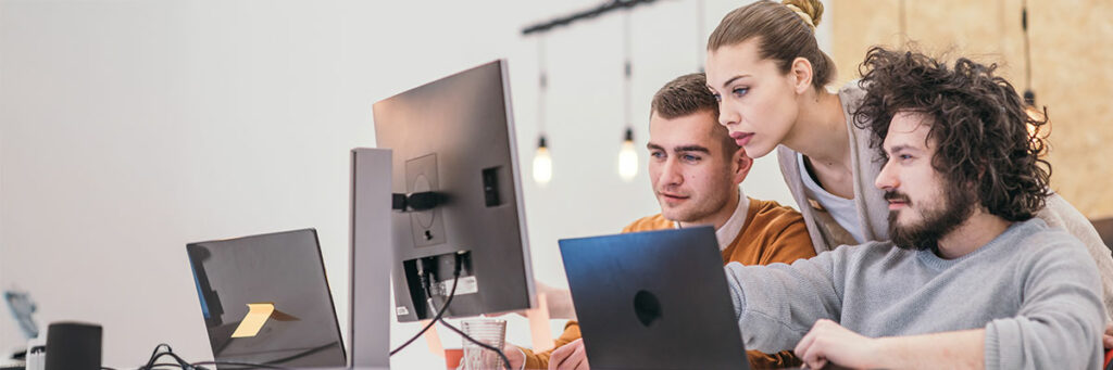 Bild på tech team som jobbar med vibe coding